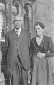 Mr & Mrs Robinson, outside the Manor House. c.1900