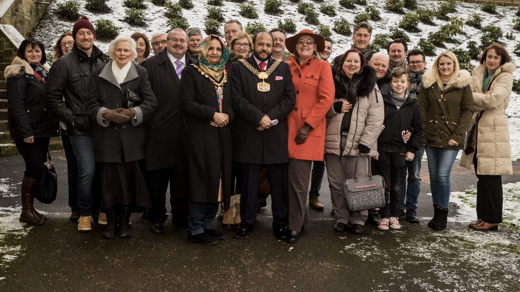 The VIPs posing just before the official opening - wrapped up warm for the cold