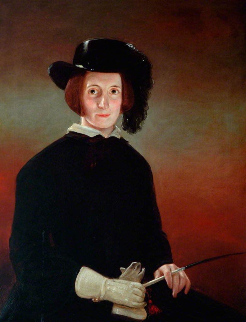 Sarah Hannah Butterfield dressed in a black riding habit, with black hat, white gloves