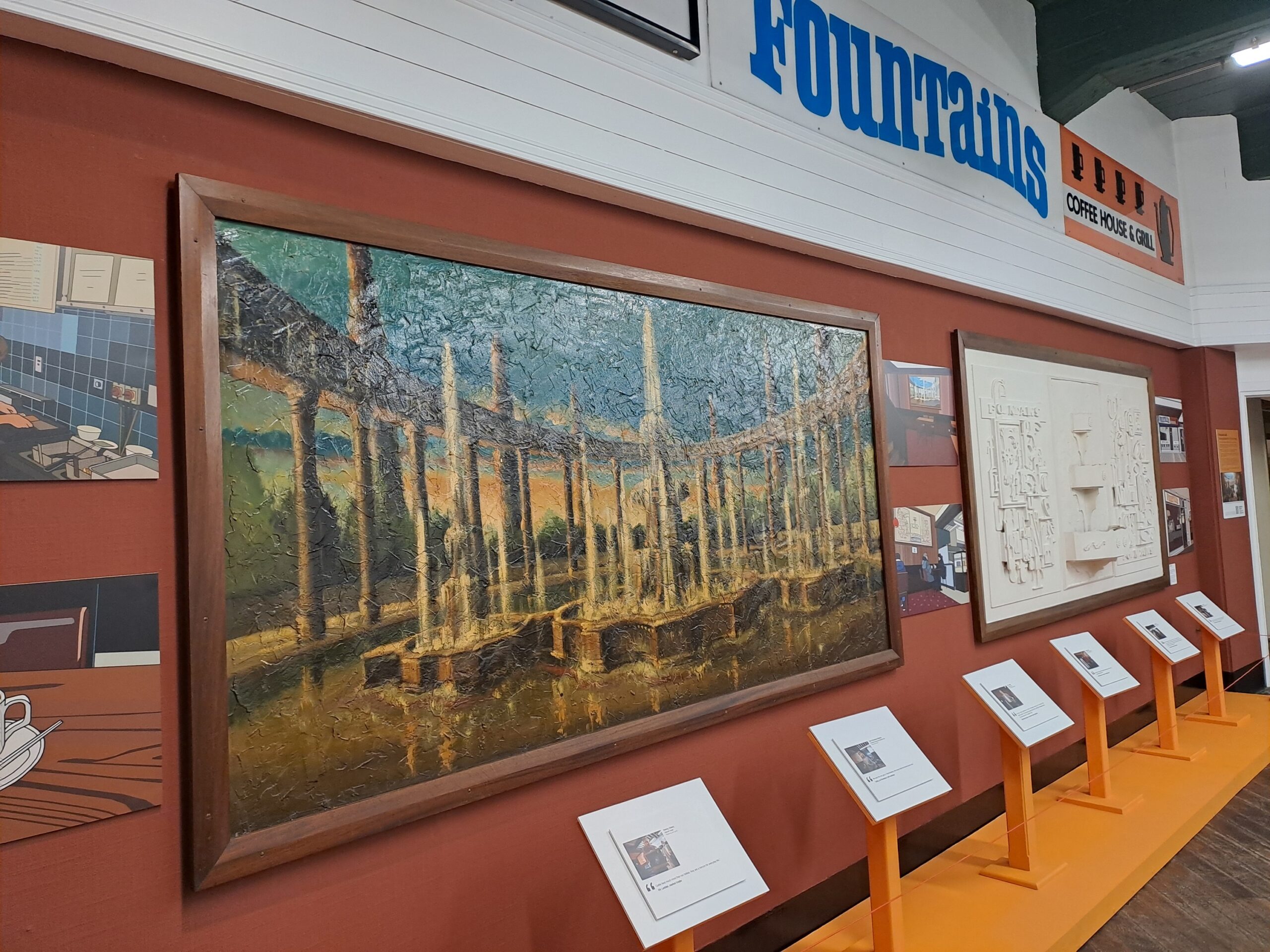 Close of up of the painting that gave fountains cafe its name