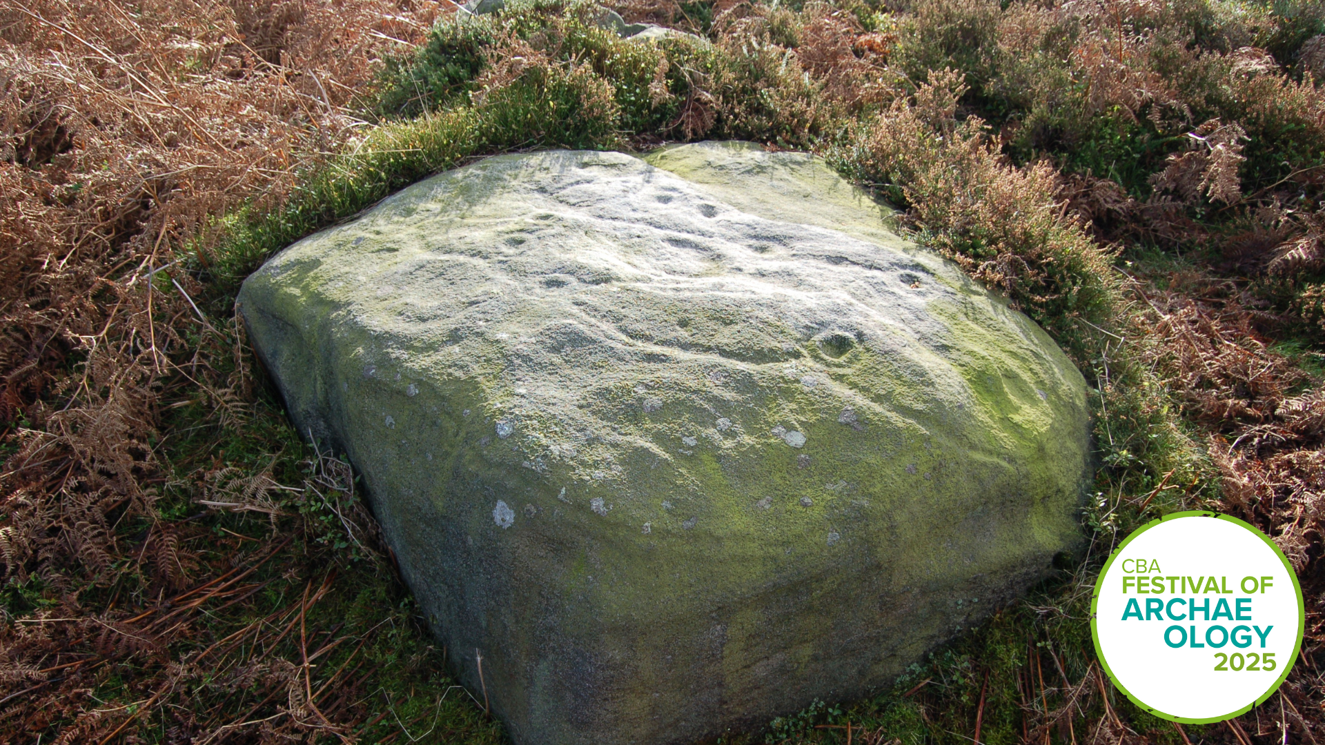 carved stone in a moorland landscape