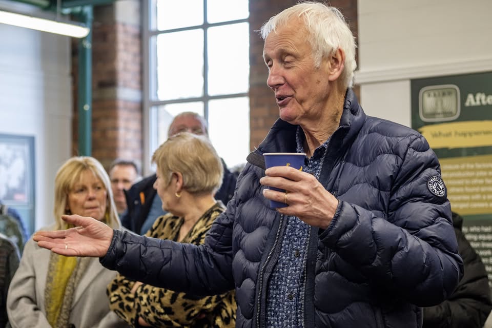people talking in previous Bairds exhibition - cuppa in hand!