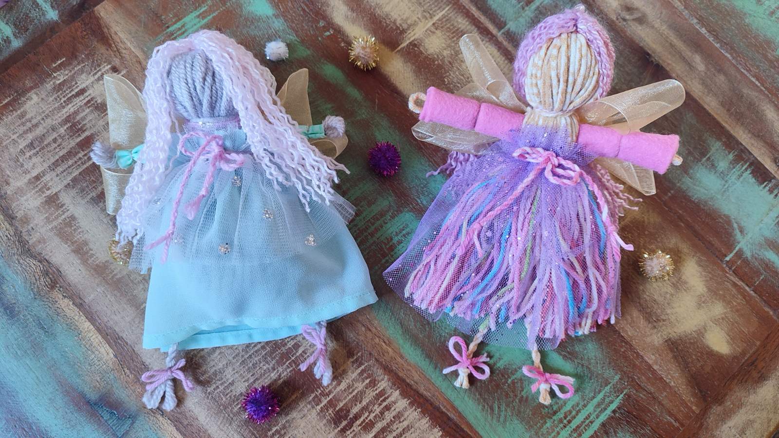 Montanka or Yarn dolls in shades of pink and purple