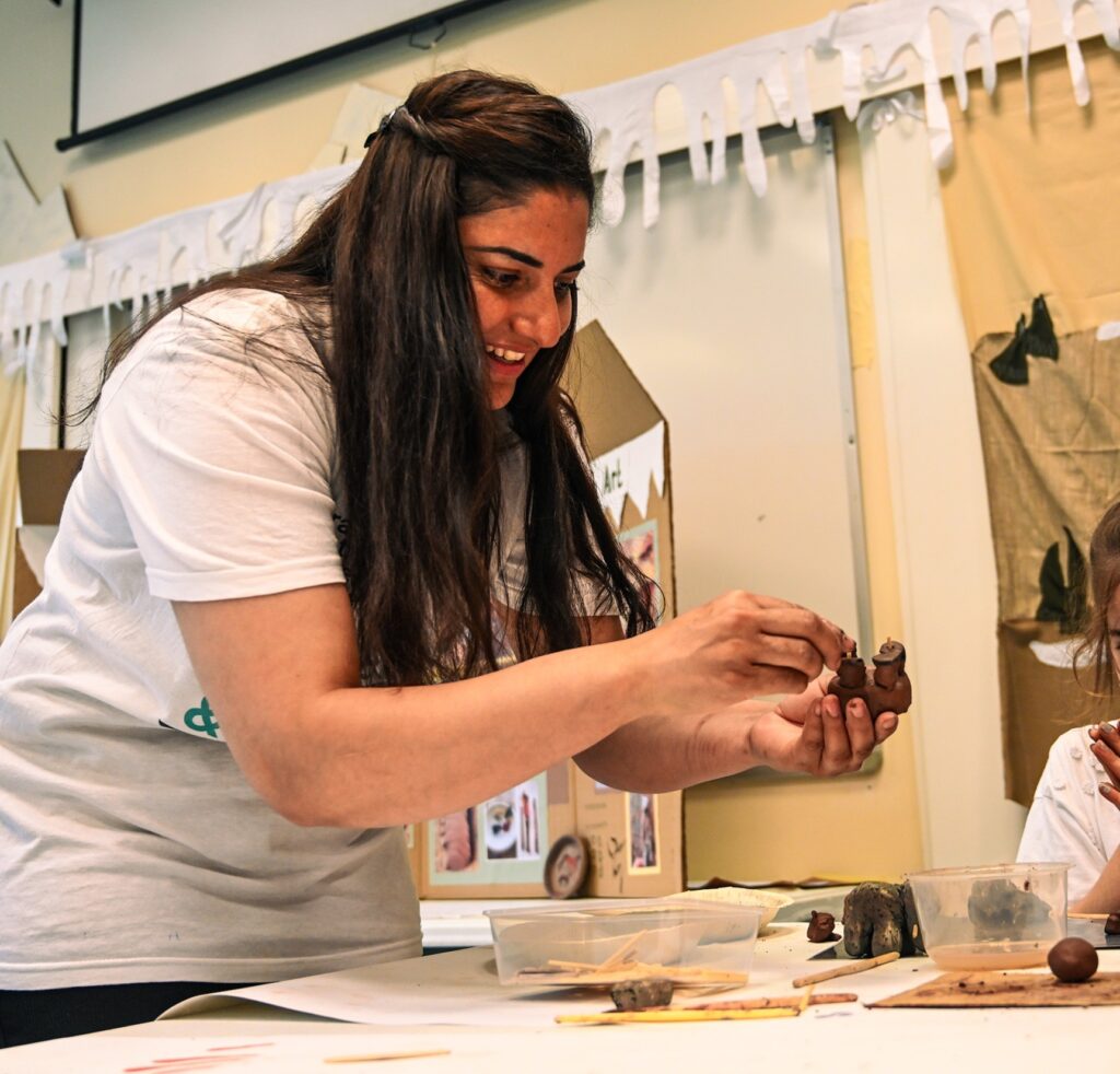 a volunteer running a craft fair