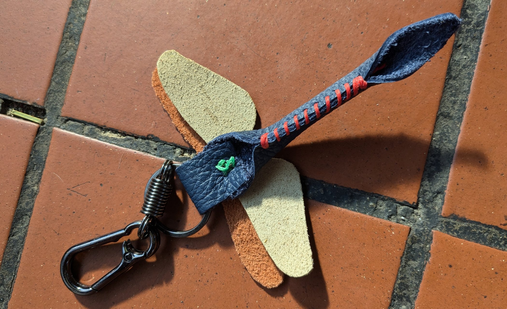 a key chain with leather straps