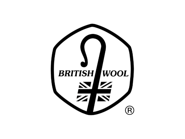 Greyscale British Wool logo - depicts a crook superimposed over the British Union flag with the word 'British Wool (either side of the crook), enclosed in a hexagon