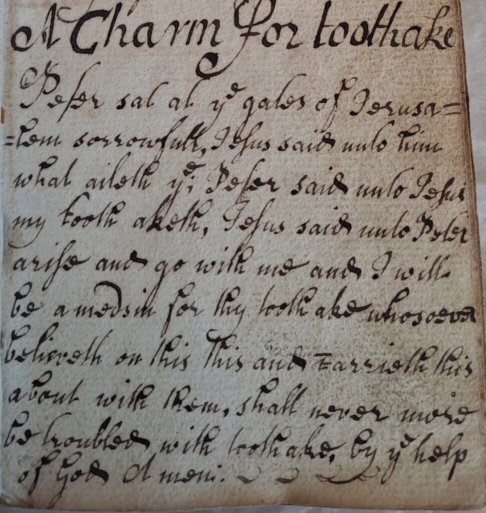 Handwritten folk charm invoking biblical figures to cure toothache.