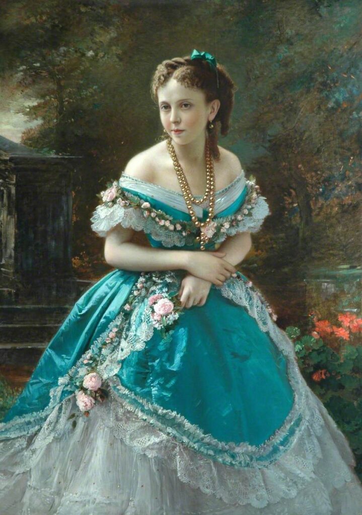 A painted portrait of a young woman in an ornate turquoise gown with lace and pink roses. She wears gold jewelry and has curled hair tied with a matching ribbon. She stands in a lush garden with greenery and flowers, with part of a stone structure visible behind her.